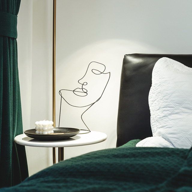 Abstract Metal Face Figure Ornament